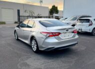 2019 Toyota Camry Ascent Sport Hybrid Sedan in Silver.