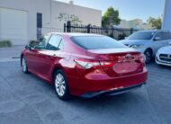 2020 Toyota Camry Ascent Sedan in Red.