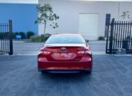 2020 Toyota Camry Ascent Sedan in Red.