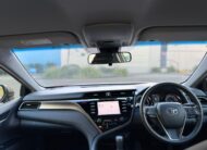 2020 Toyota Camry Ascent Sedan in Red.