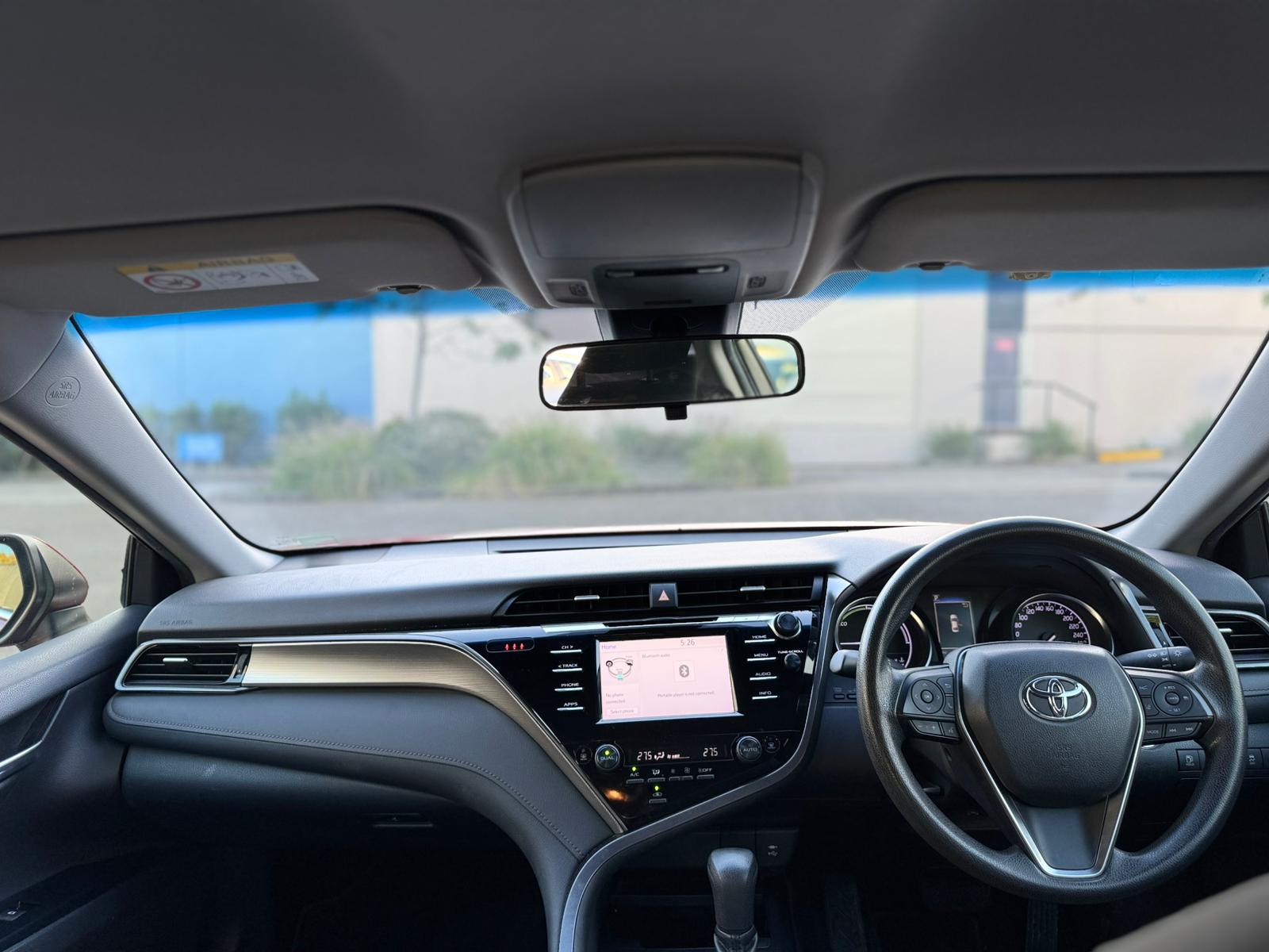 2020 Toyota Camry Ascent Sedan in Red.