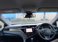 2020 Toyota Camry Ascent Sedan in Red.