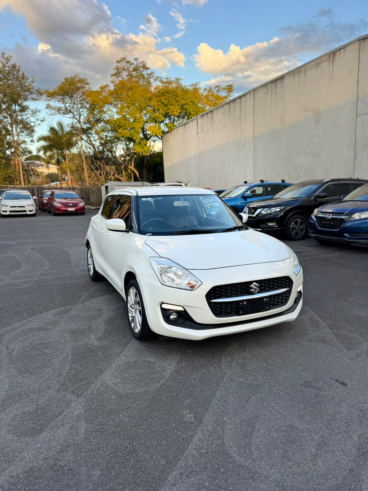 2022 Suzuki Swift GL Navigator Hatchback in White.