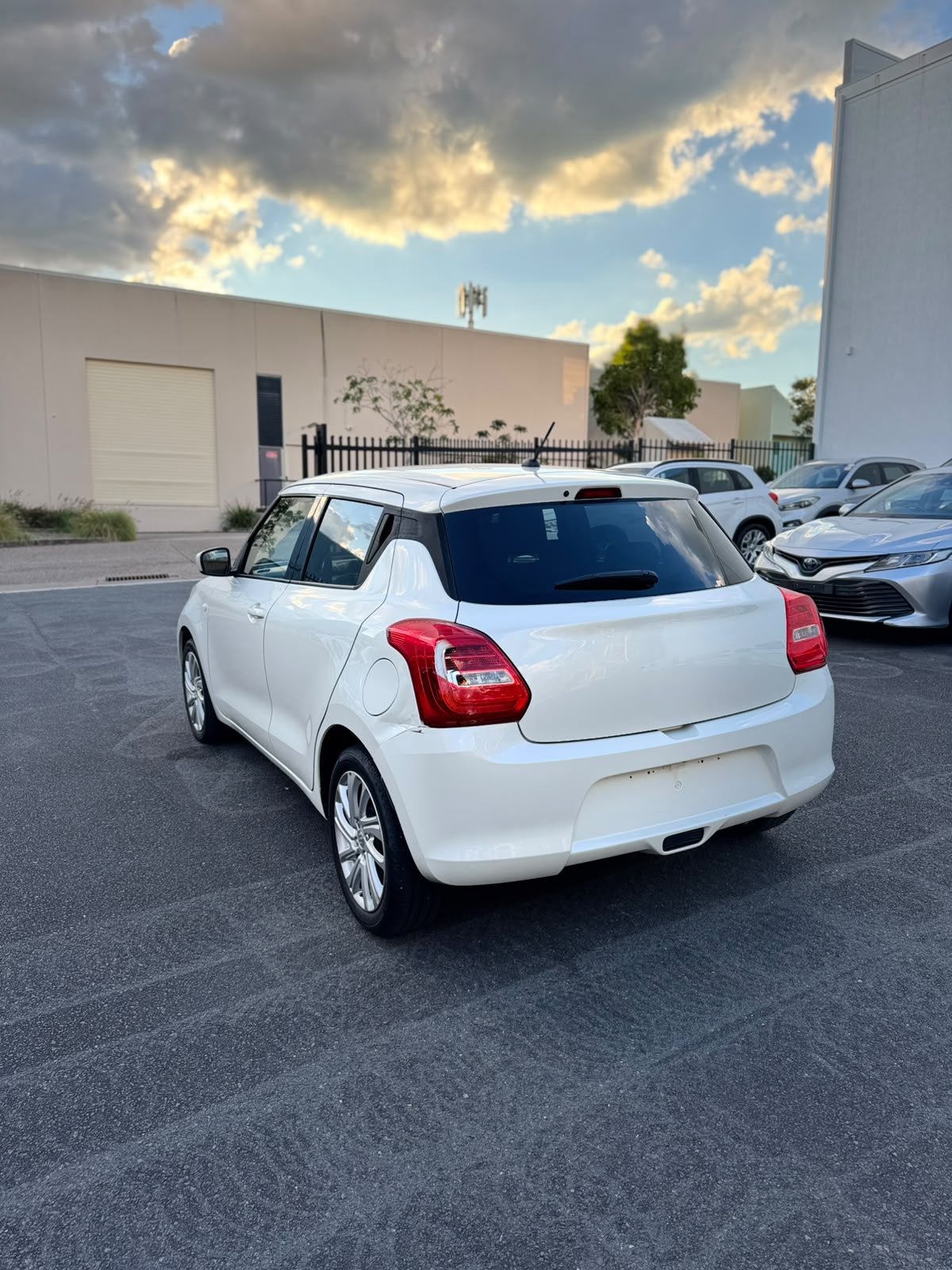 2022 Suzuki Swift GL Navigator Hatchback in White.