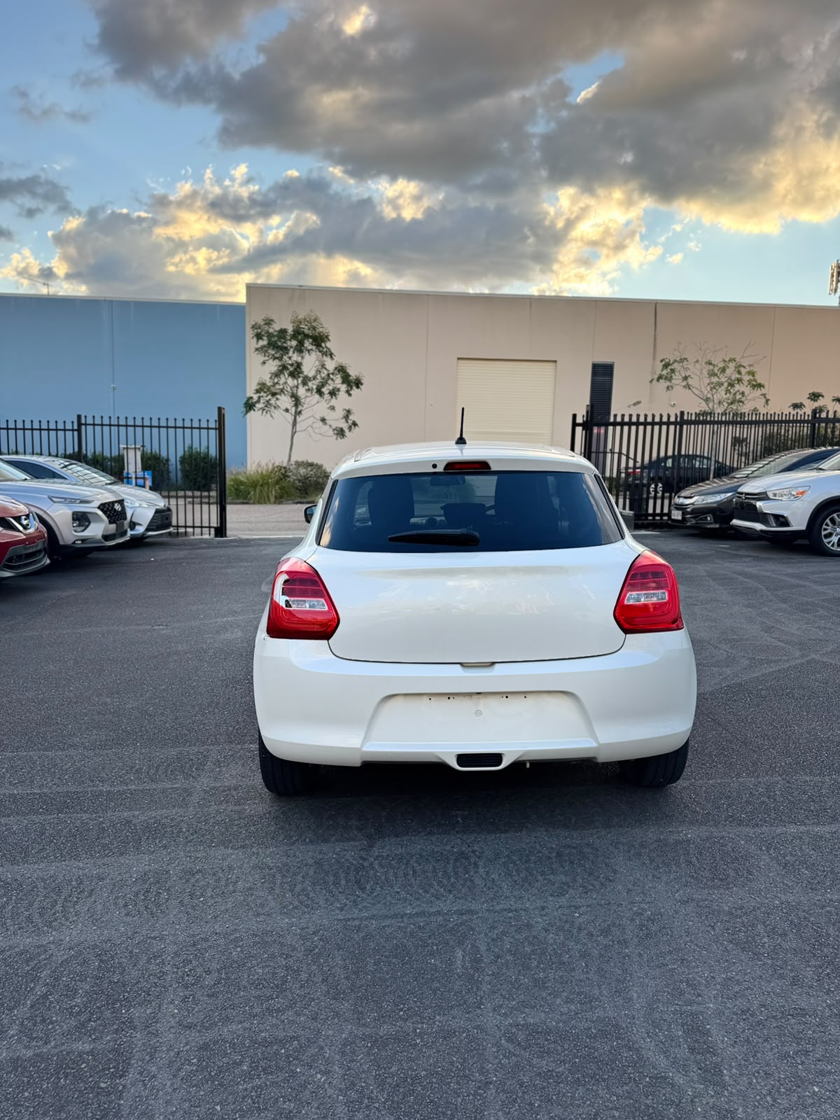 2022 Suzuki Swift GL Navigator Hatchback in White.