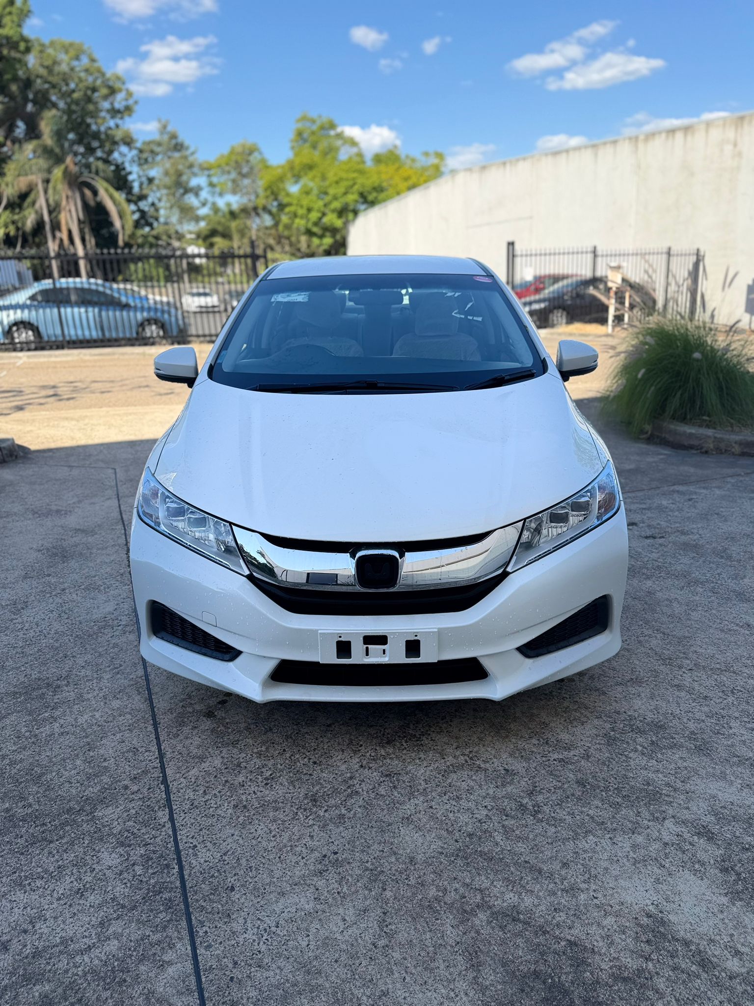2014 Honda Grace Sedan in White.