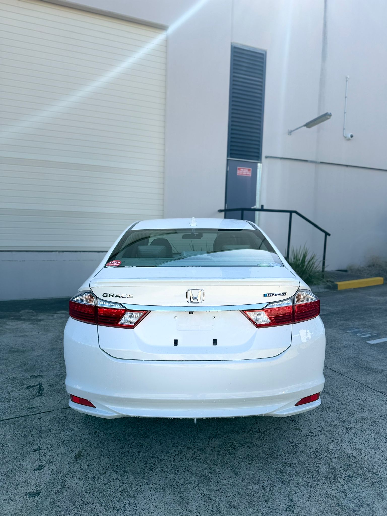 2014 Honda Grace Sedan in White.