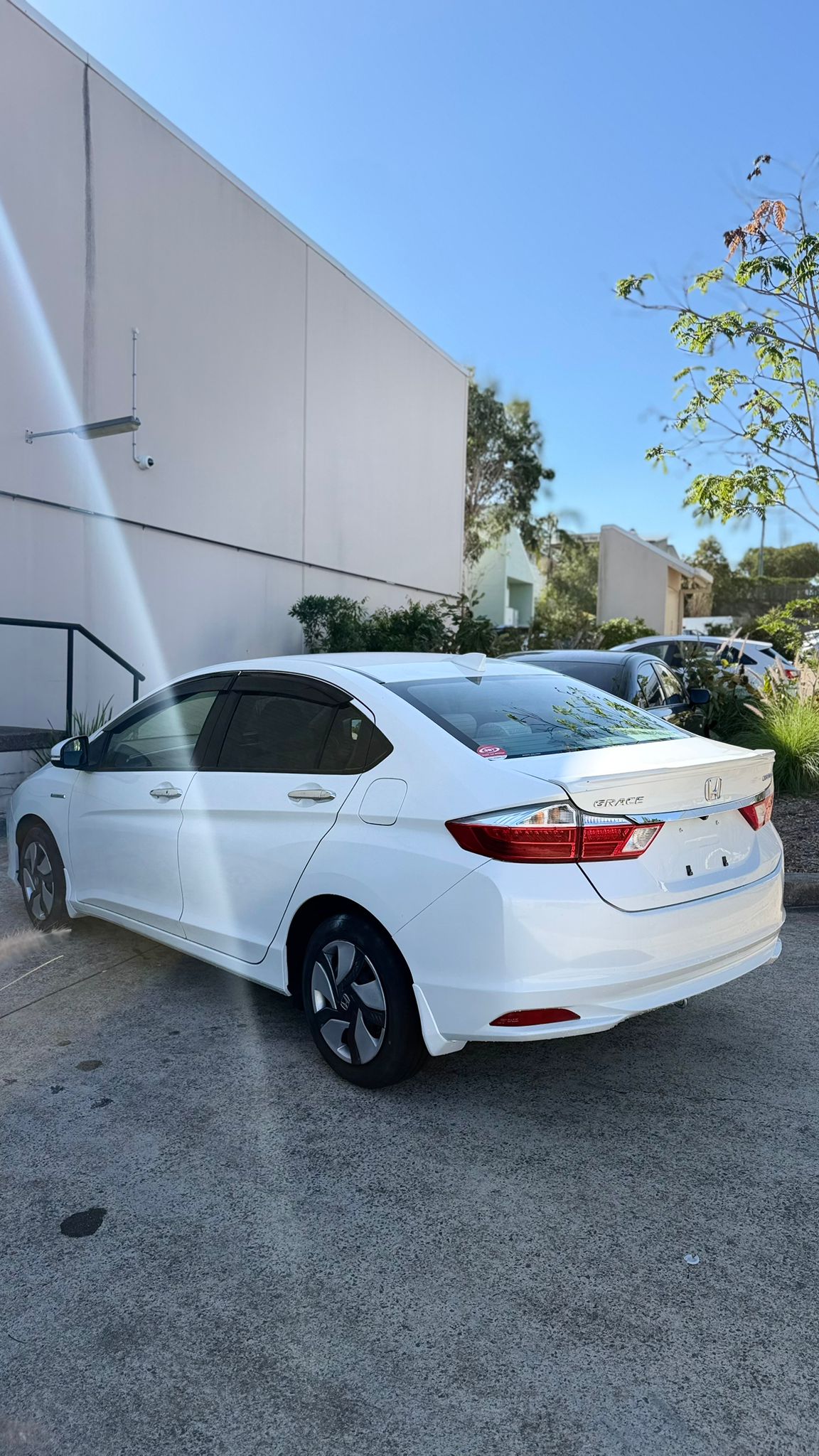 2014 Honda Grace Sedan in White.
