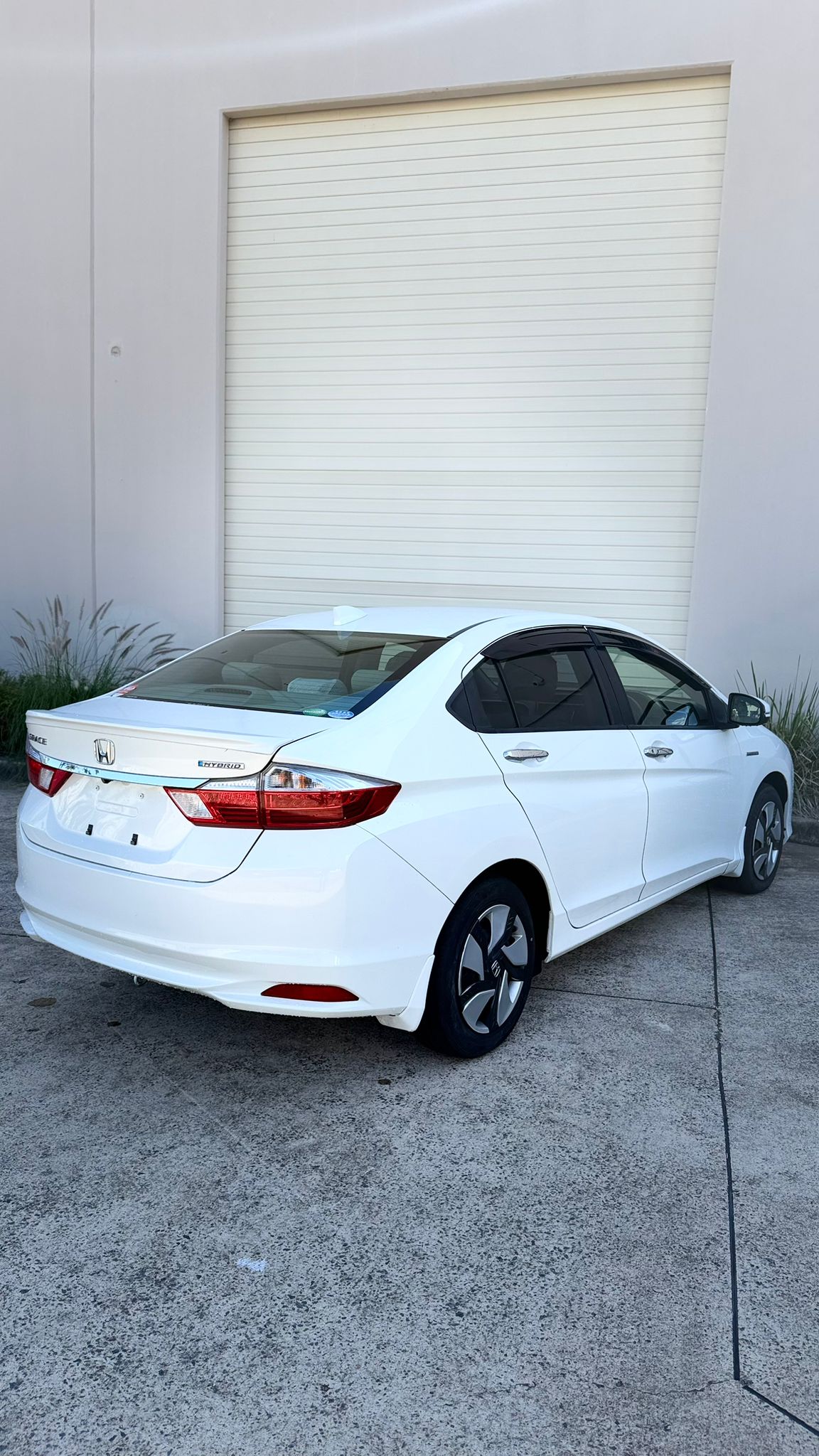 2014 Honda Grace Sedan in White.