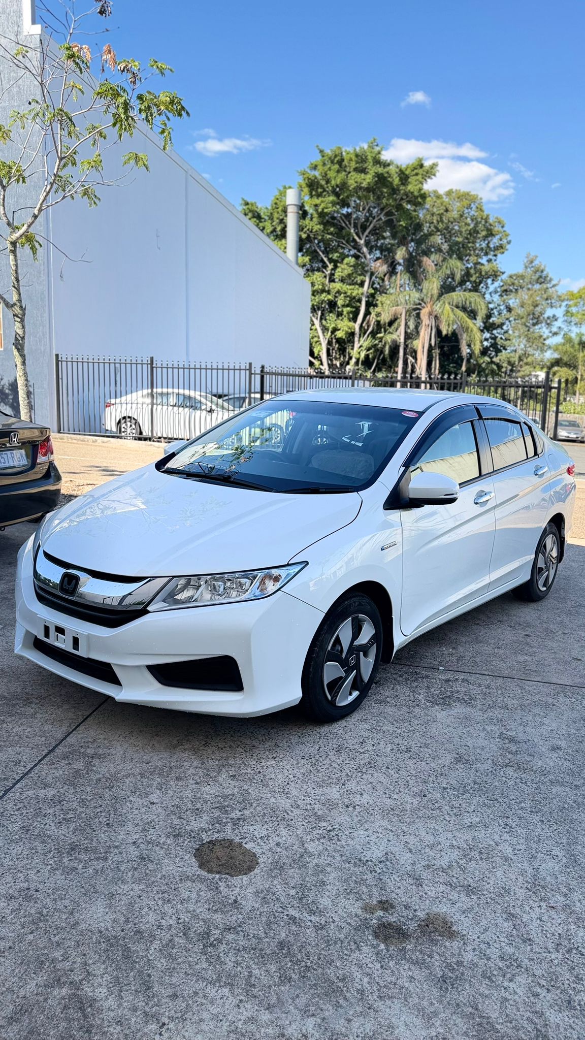 2014 Honda Grace Sedan in White.
