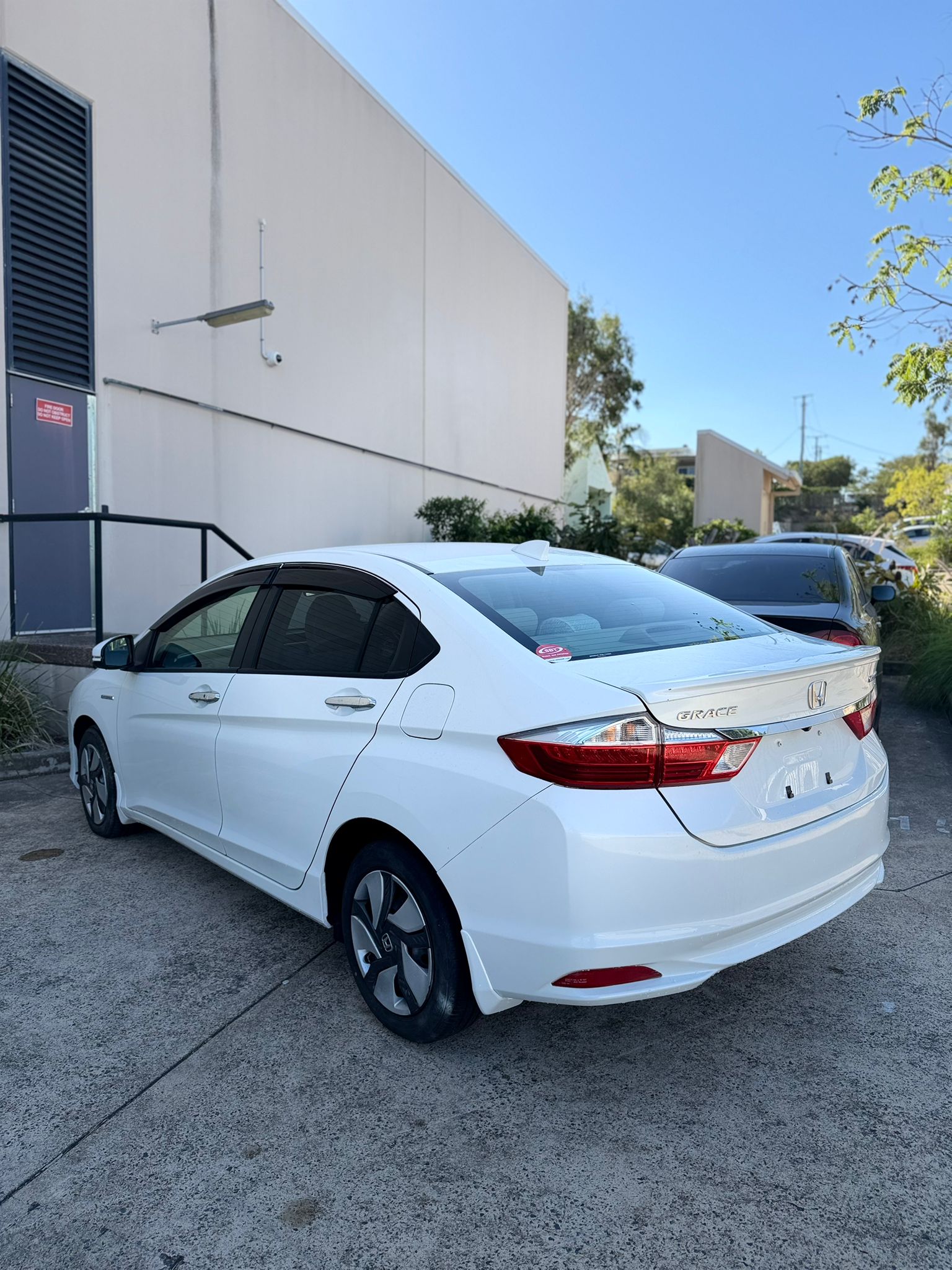 2014 Honda Grace Sedan in White.
