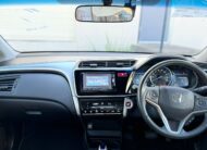 2014 Honda Grace Sedan in White.