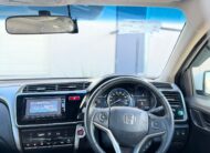 2014 Honda Grace Sedan in White.
