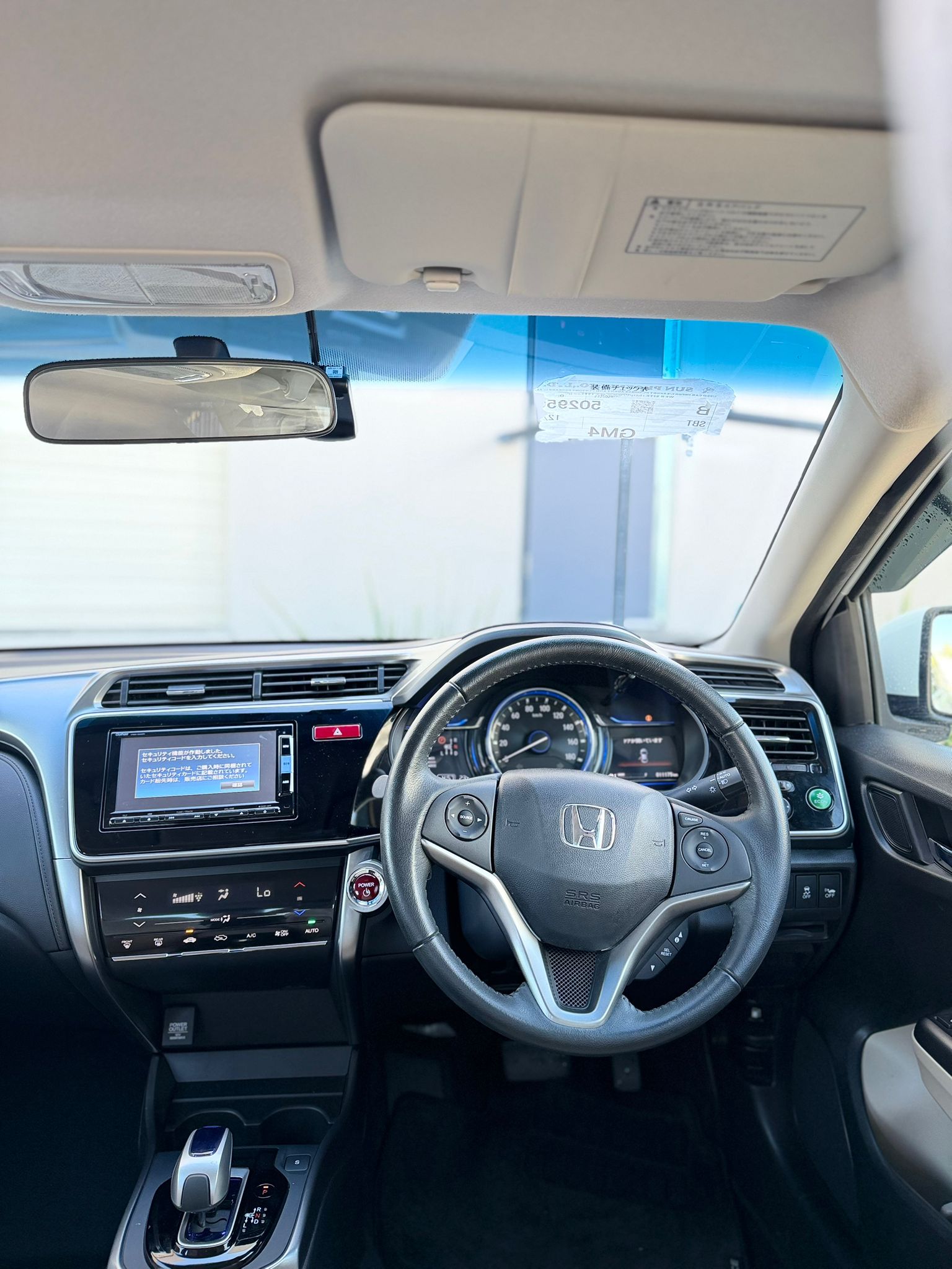 2014 Honda Grace Sedan in White.