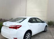 2015 Toyota Corolla Ascent Sedan in White.