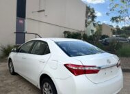 2015 Toyota Corolla Ascent Sedan in White.