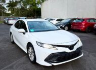 2020 Toyota Camry Ascent Sedan in White.