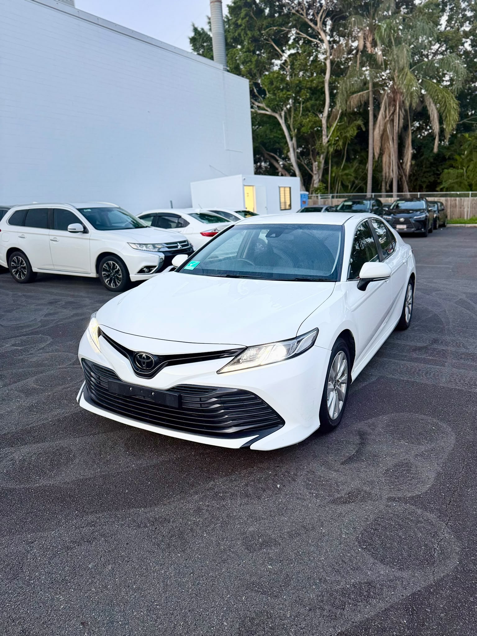 2020 Toyota Camry Ascent Sedan in White.