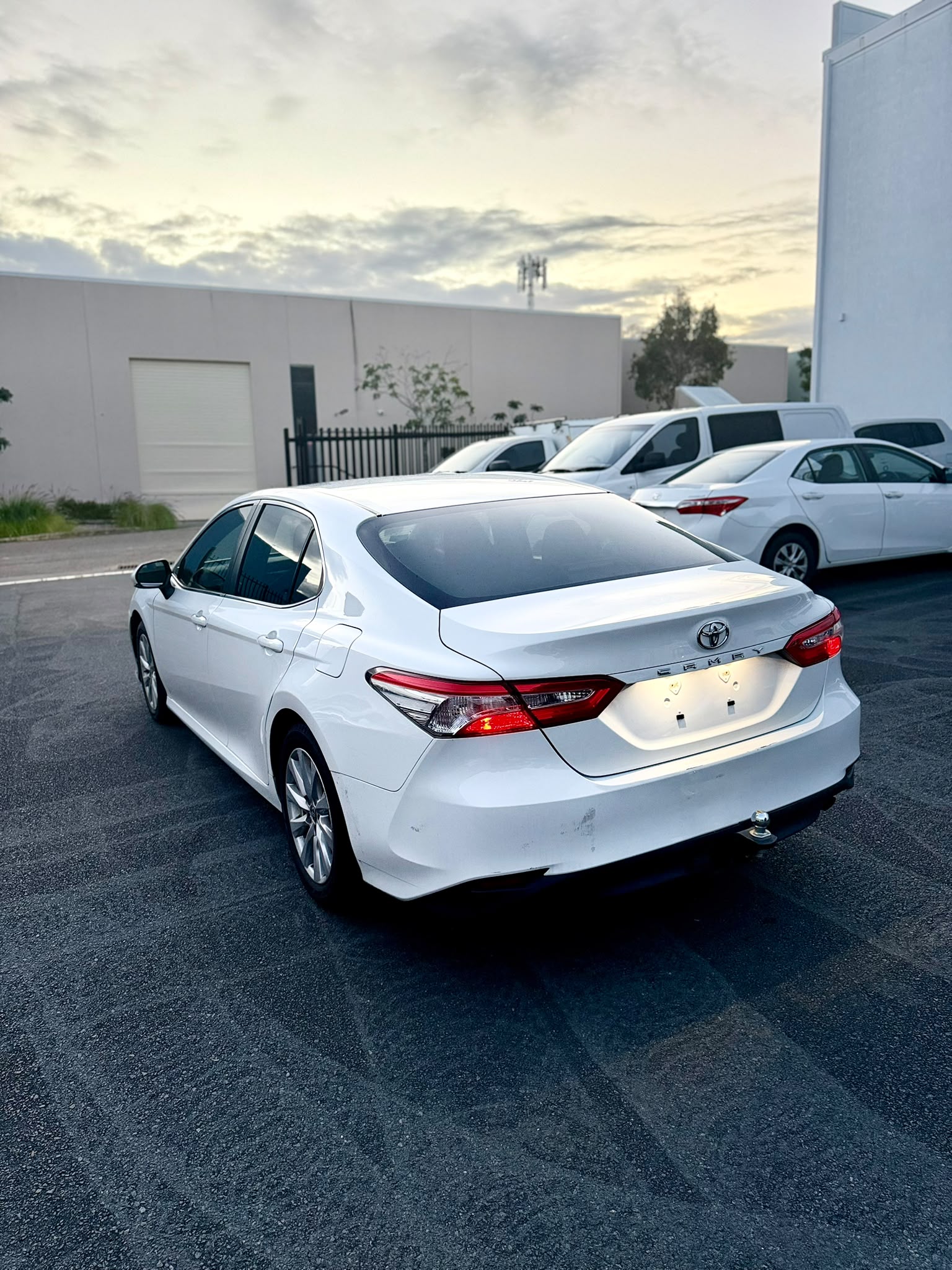 2020 Toyota Camry Ascent Sedan in White.