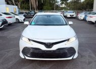 2020 Toyota Camry Ascent Sedan in White.