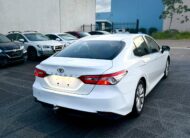 2020 Toyota Camry Ascent Sedan in White.
