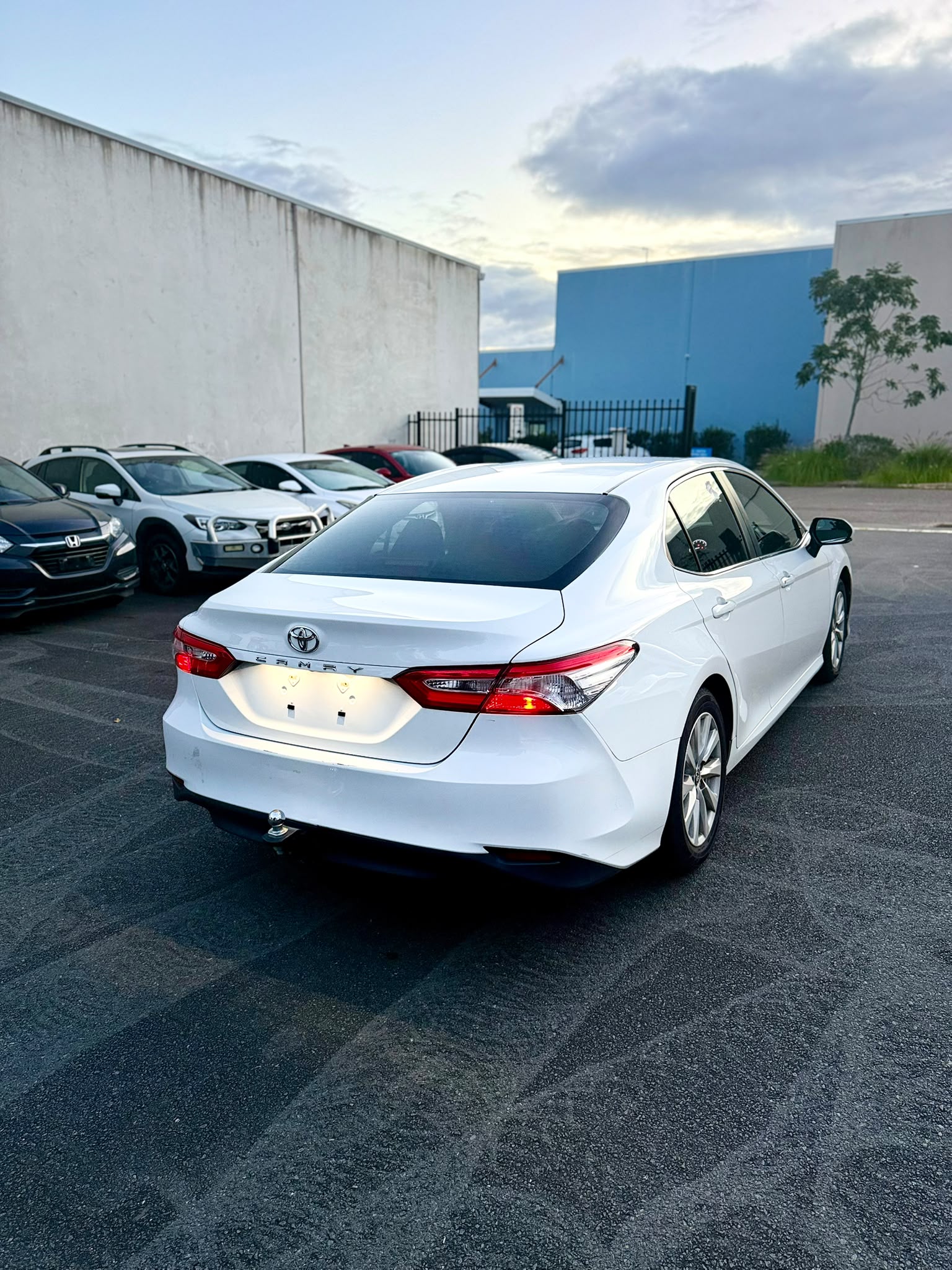 2020 Toyota Camry Ascent Sedan in White.