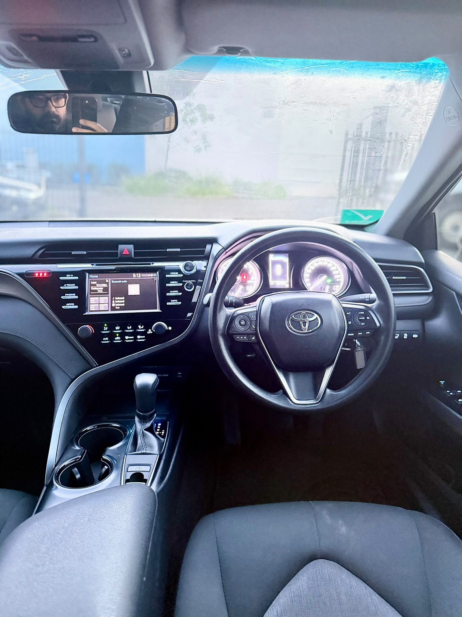 2020 Toyota Camry Ascent Sedan in White.