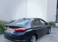 2015 Honda Grace Sedan in Brown.