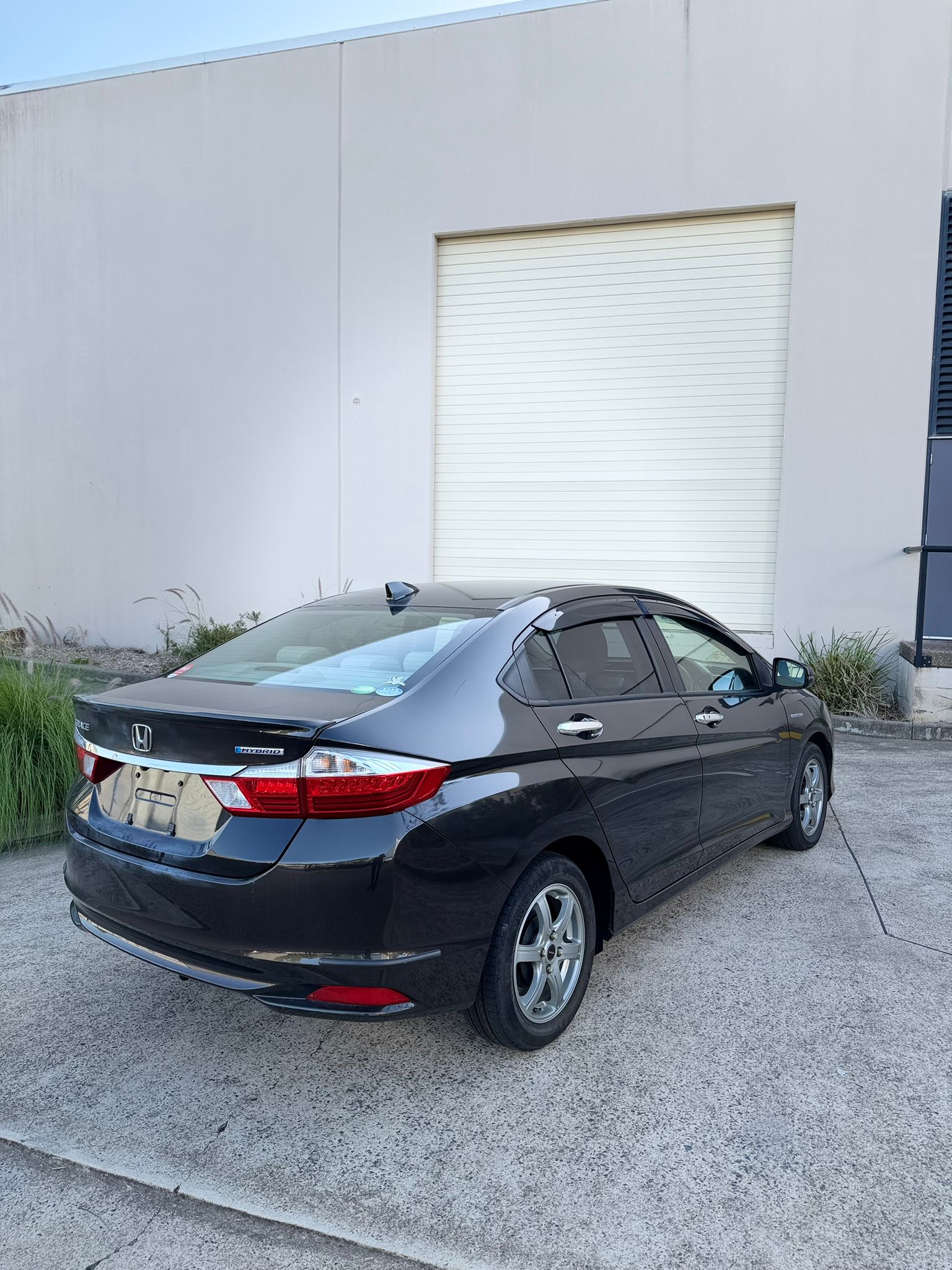 2015 Honda Grace Sedan in Brown.