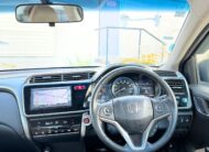 2015 Honda Grace Sedan in Brown.