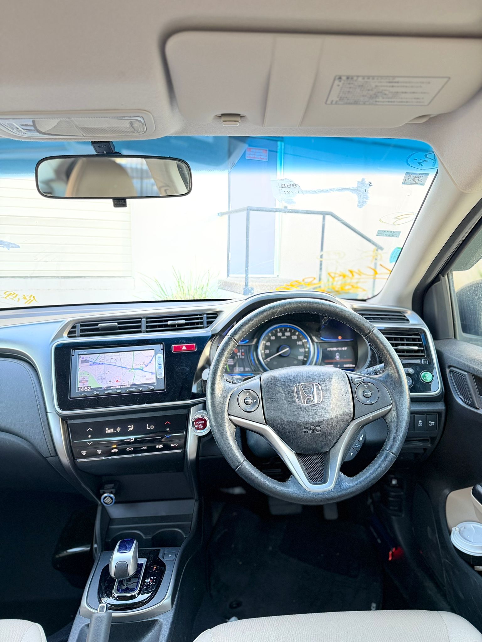 2015 Honda Grace Sedan in Brown.