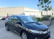 2015 Honda Grace Sedan in Brown.