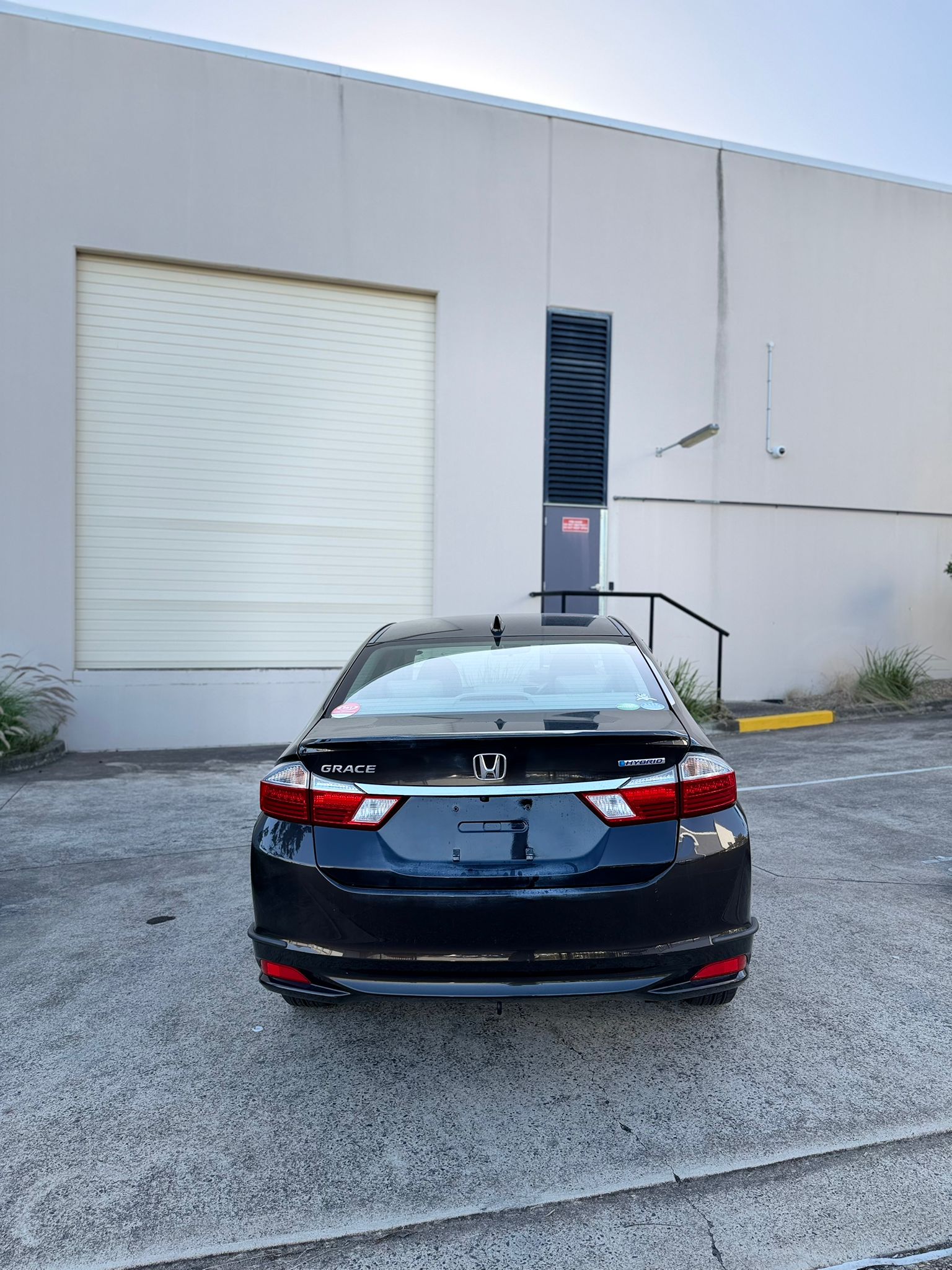 2015 Honda Grace Sedan in Brown.