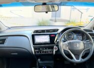 2015 Honda Grace Sedan in Brown.