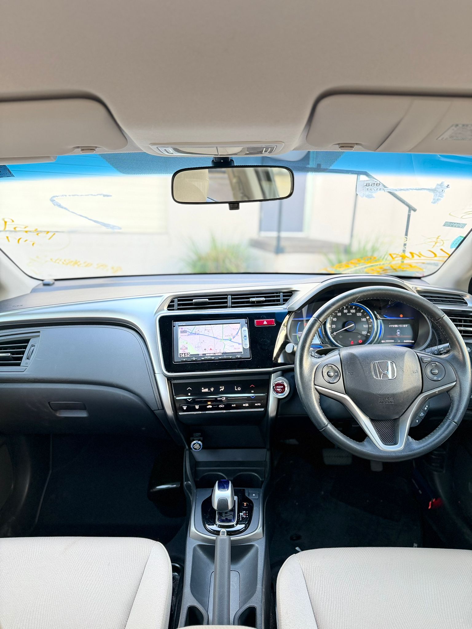 2015 Honda Grace Sedan in Brown.