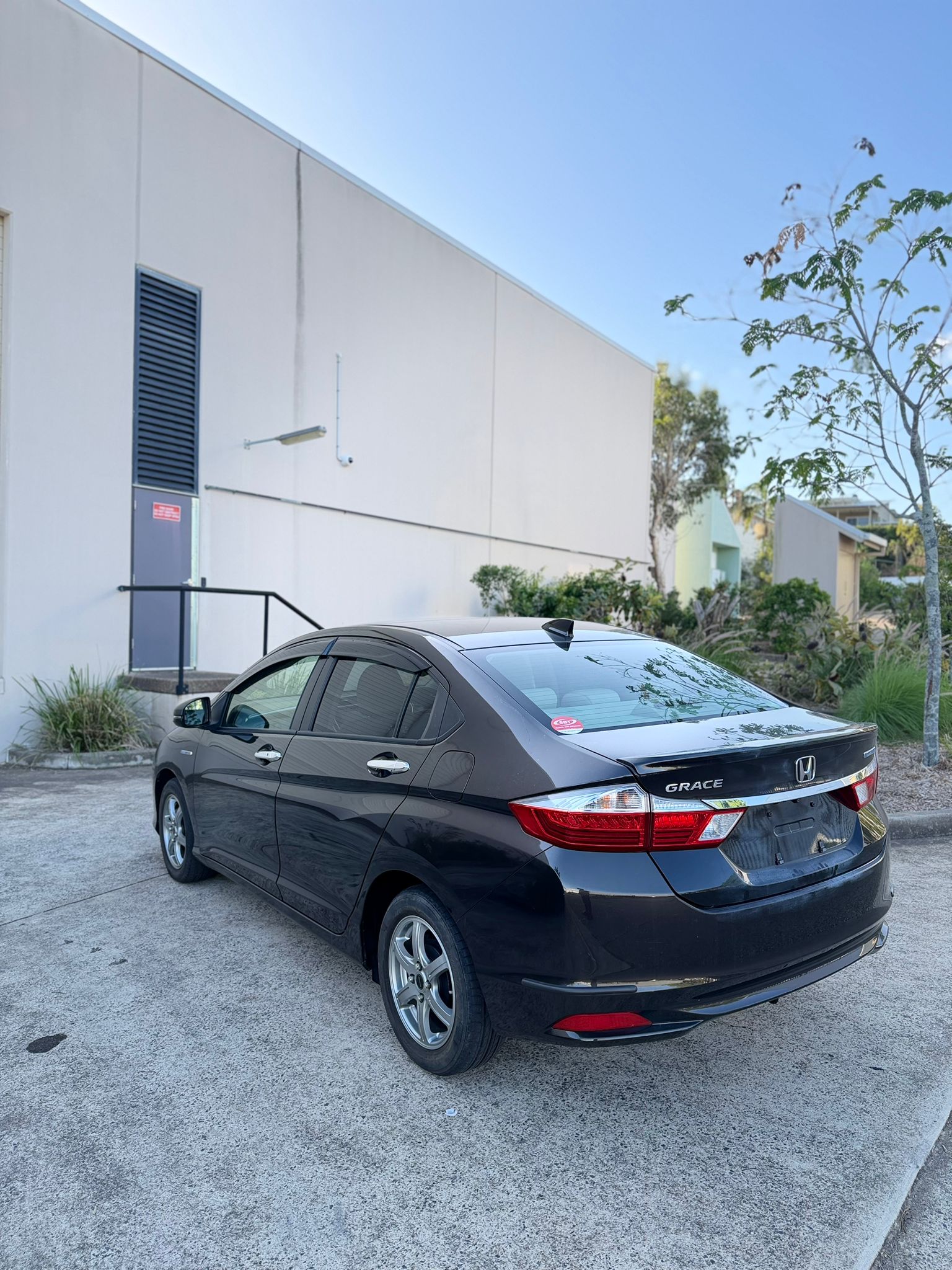 2015 Honda Grace Sedan in Brown.