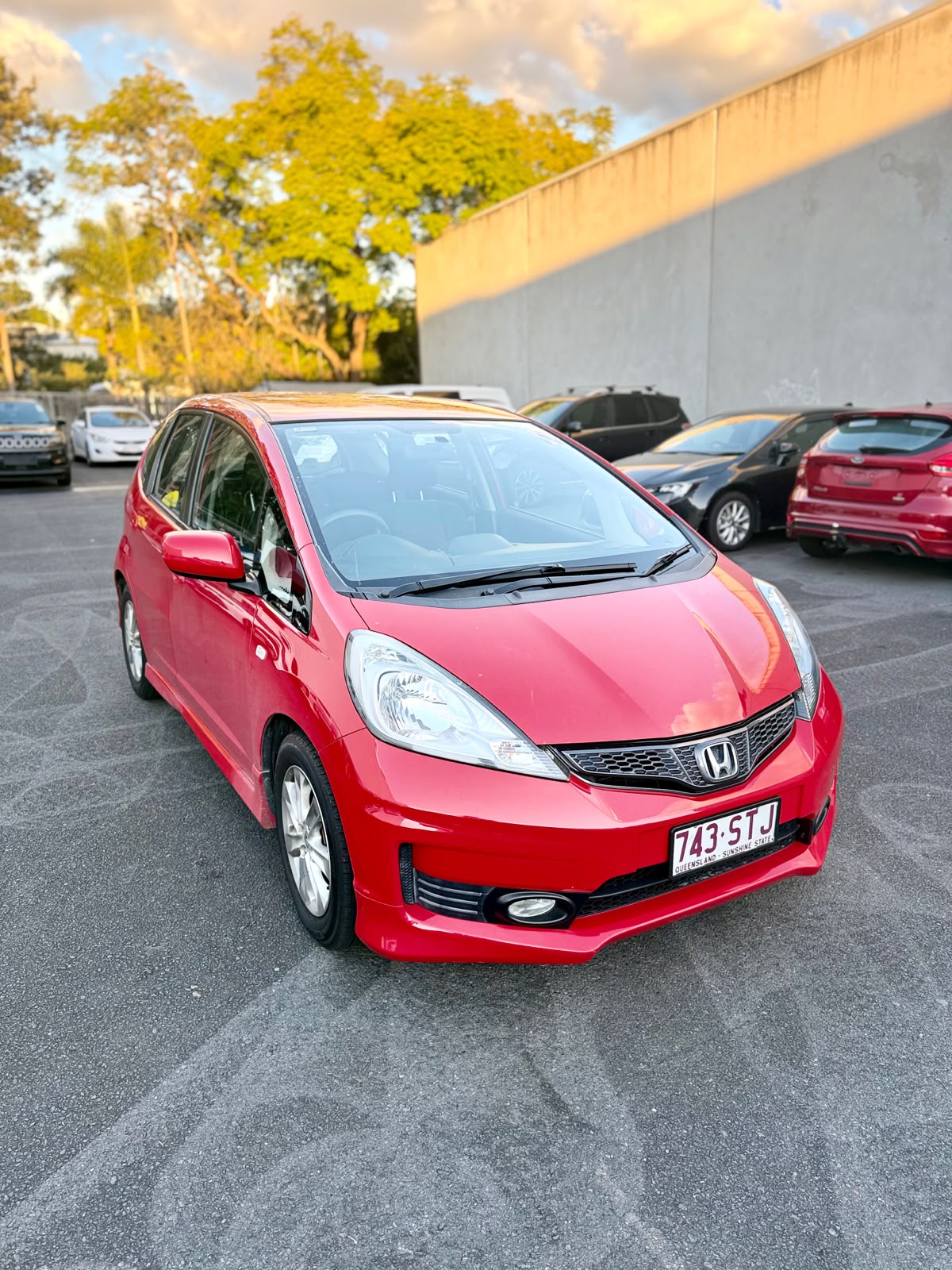 2012 Honda Jazz VTi GE MY12 Hatchback in Red.