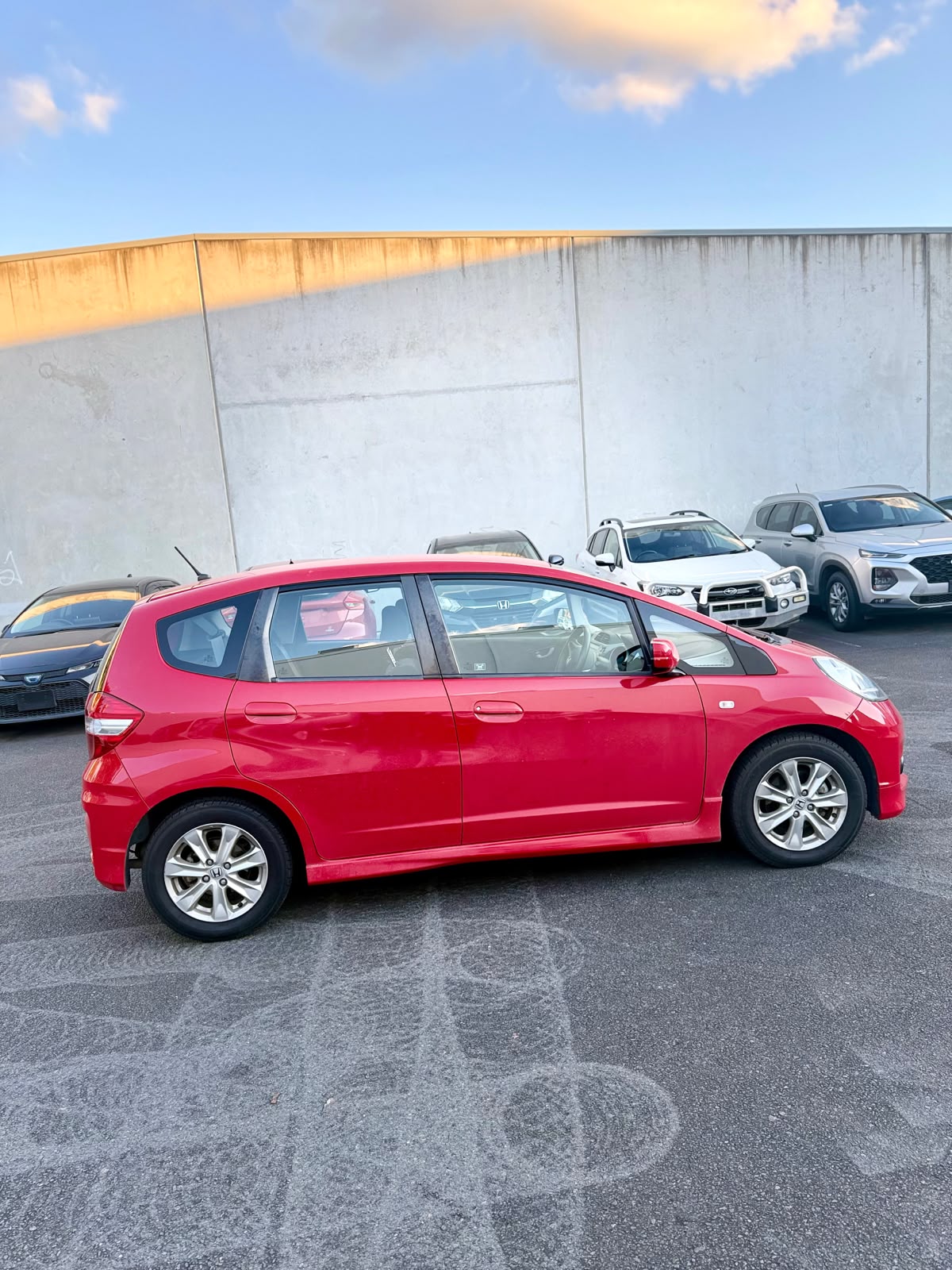 2012 Honda Jazz VTi GE MY12 Hatchback in Red.