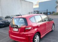 2012 Honda Jazz VTi GE MY12 Hatchback in Red.