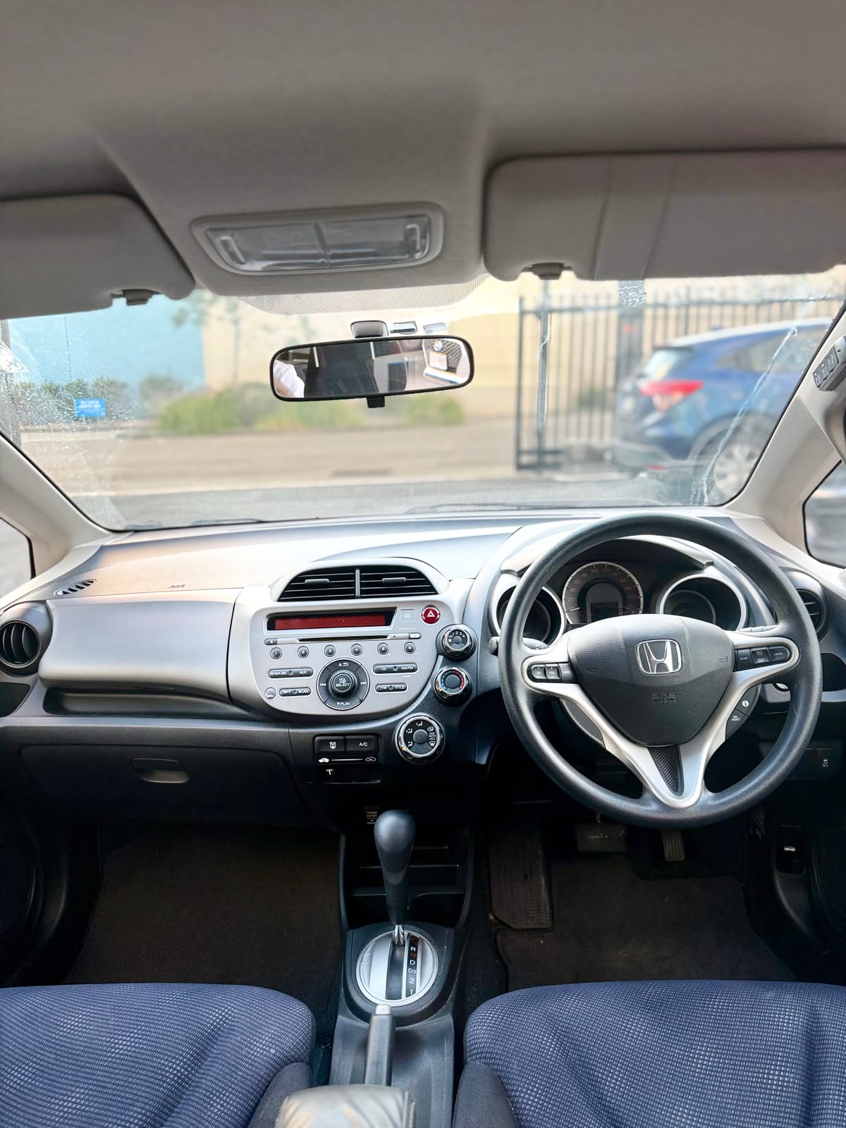 2012 Honda Jazz VTi GE MY12 Hatchback in Red.