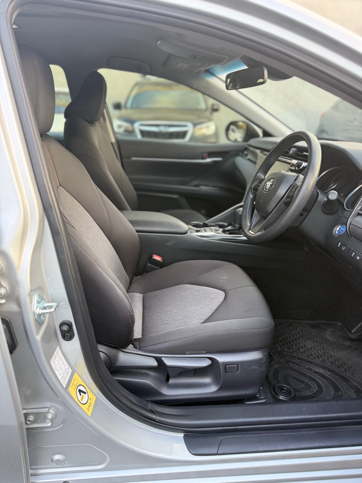 2020 Toyota Camry Ascent Hybrid Sedan in Silver.