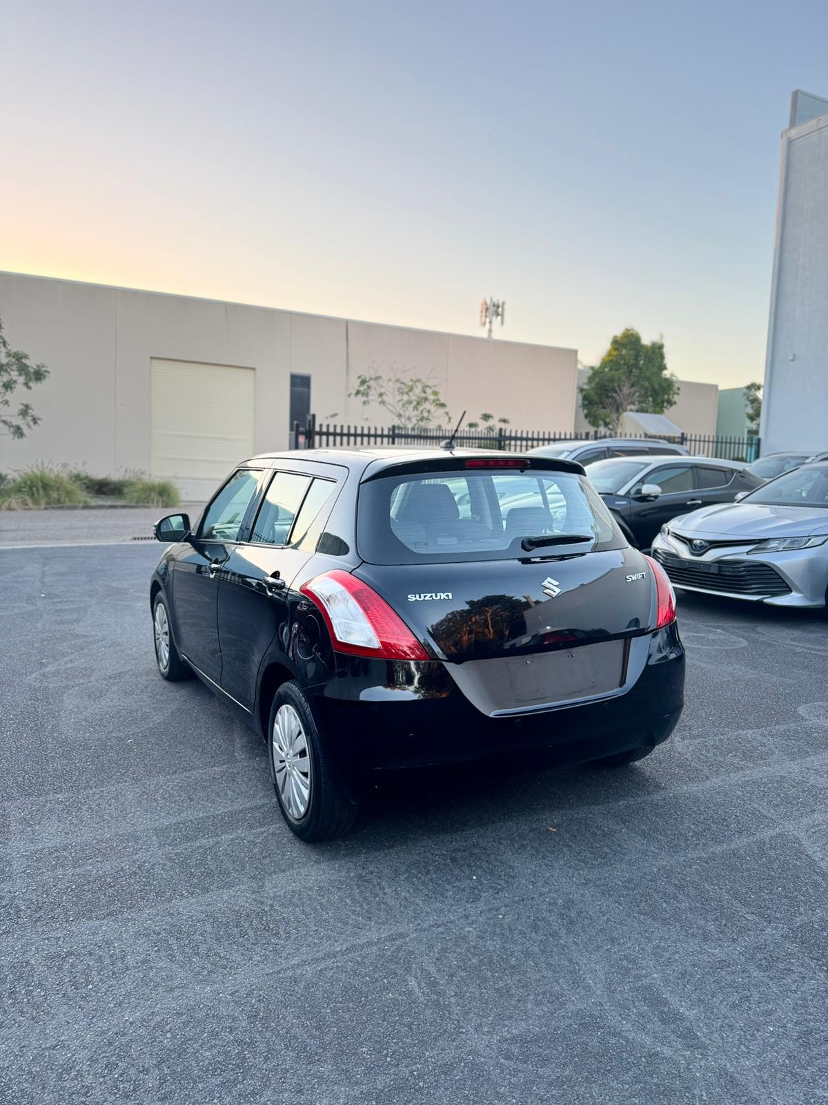 2014 Suzuki Swift GL Hatchback in Black.
