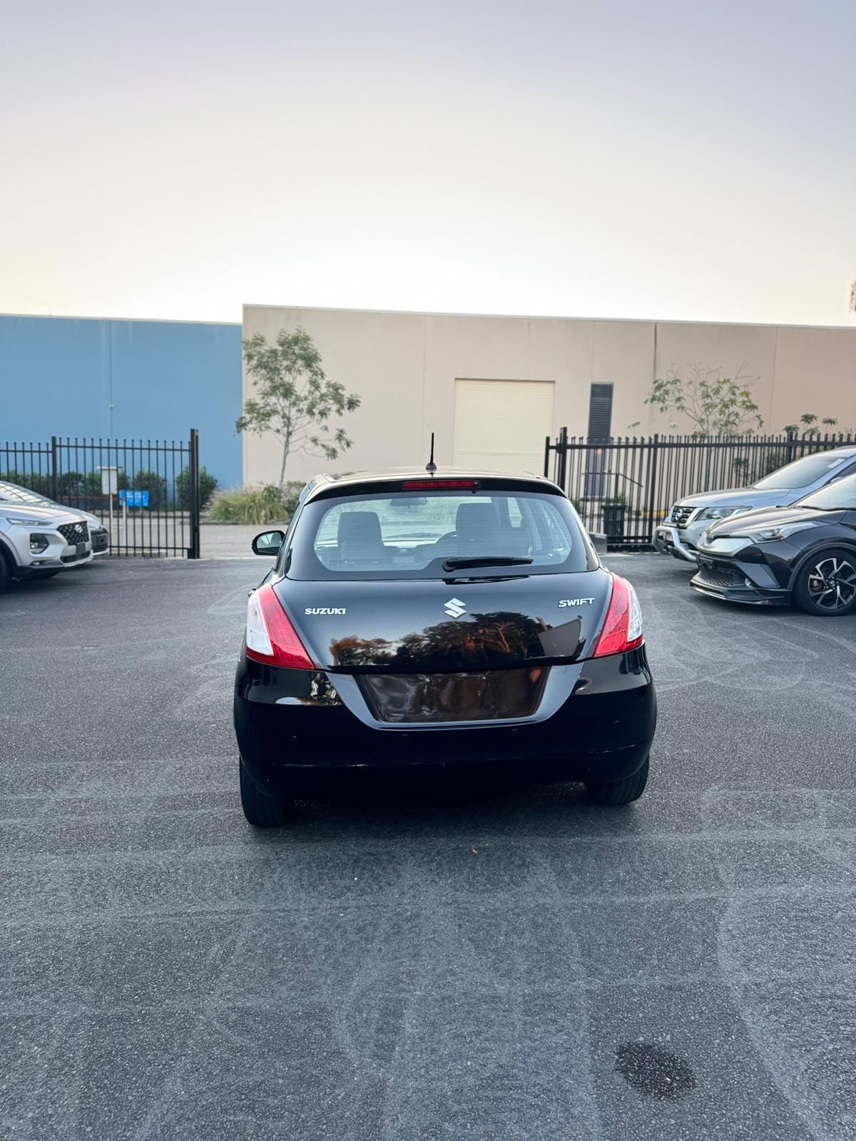 2014 Suzuki Swift GL Hatchback in Black.