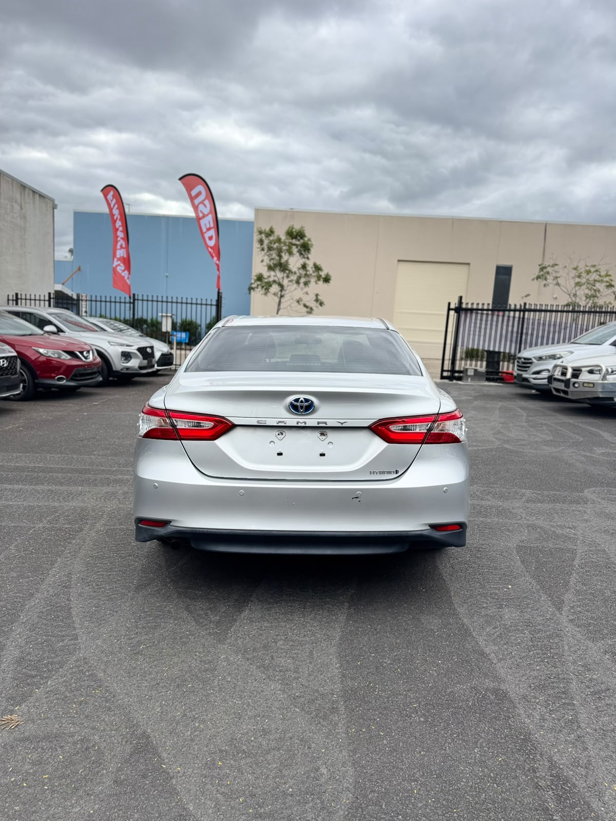 2019 Toyota Camry Ascent Hybrid Sedan in Sunrise.