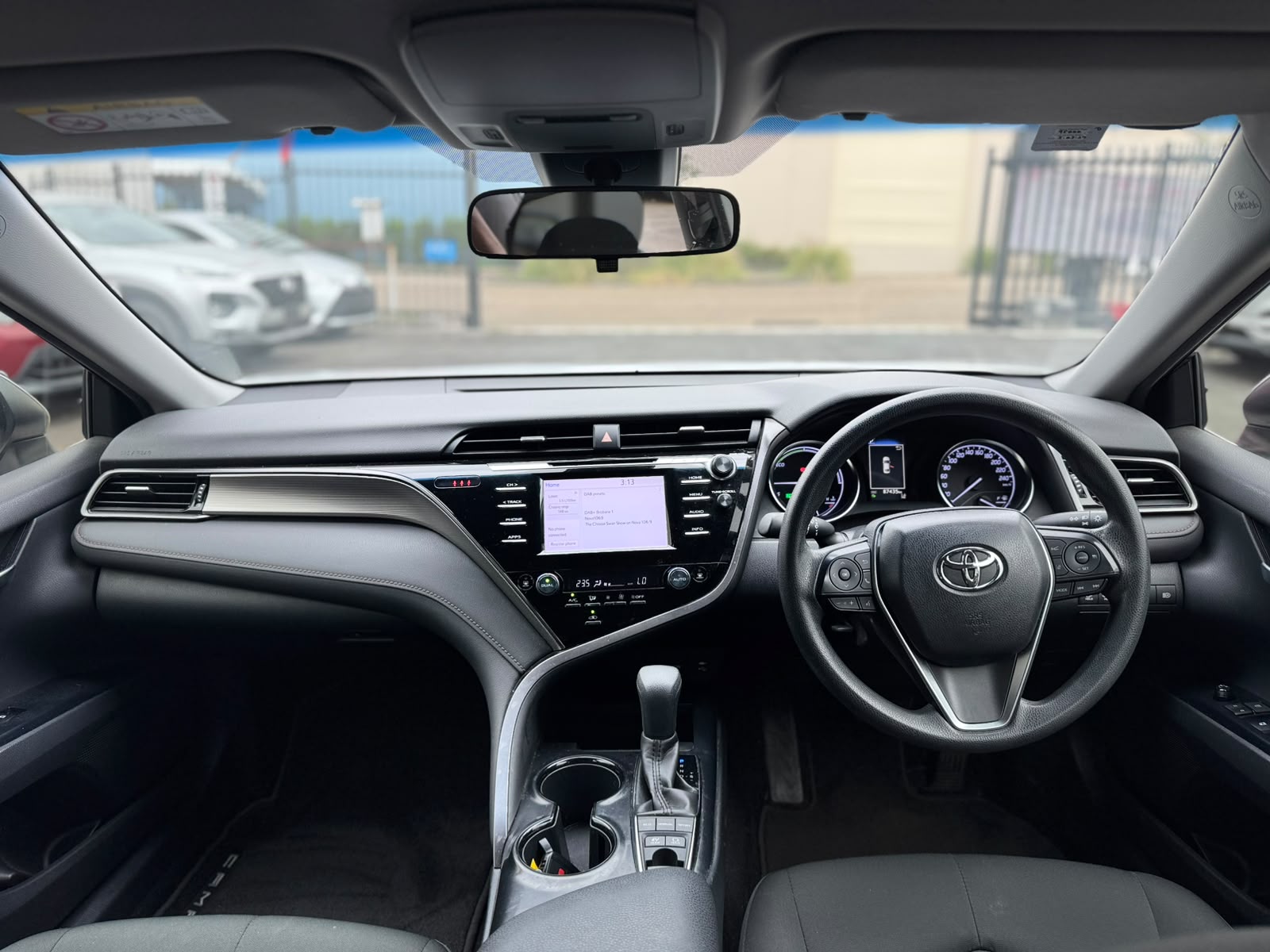 2019 Toyota Camry Ascent Hybrid Sedan in Sunrise.