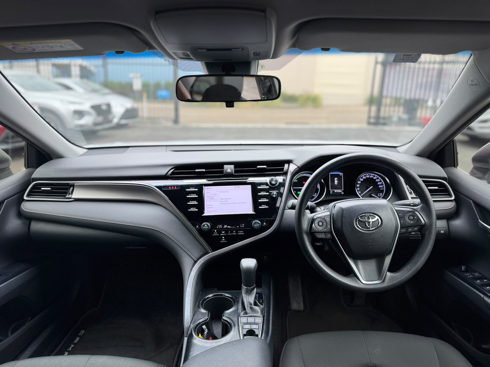 2019 Toyota Camry Ascent Hybrid Sedan in Sunrise.