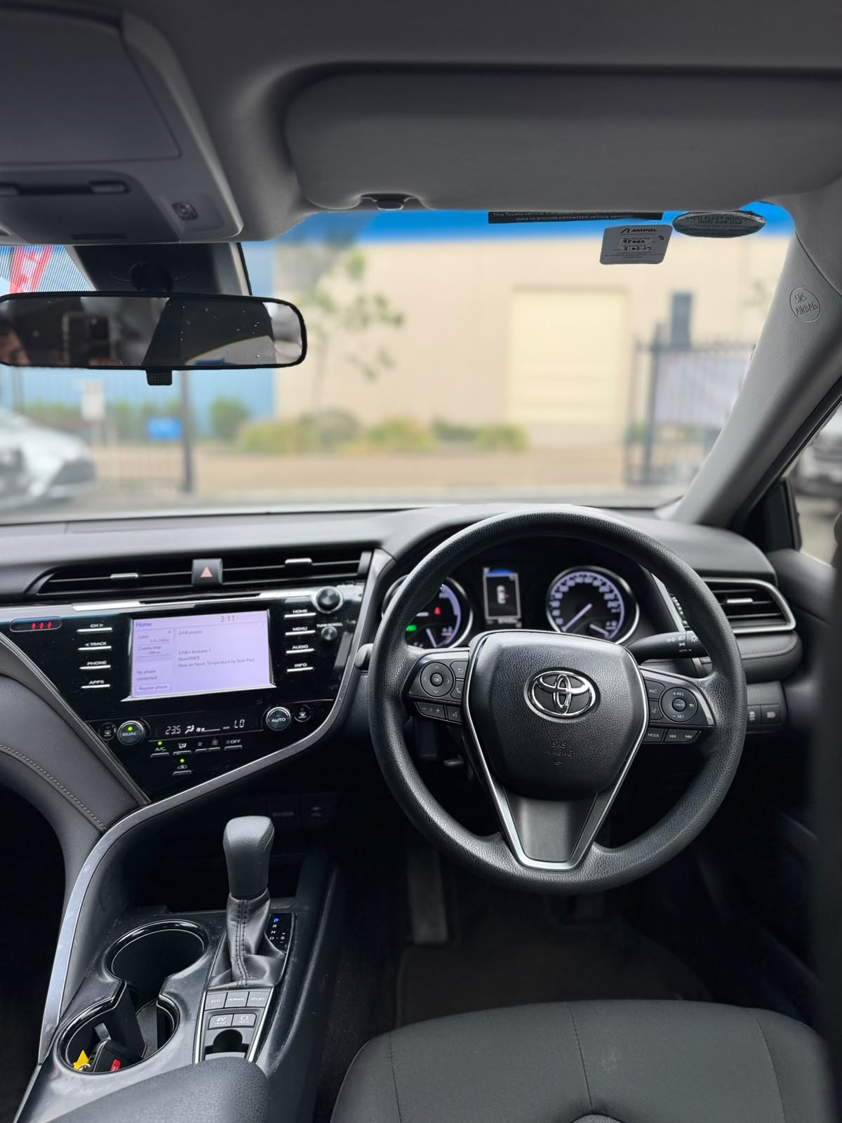 2019 Toyota Camry Ascent Hybrid Sedan in Sunrise.