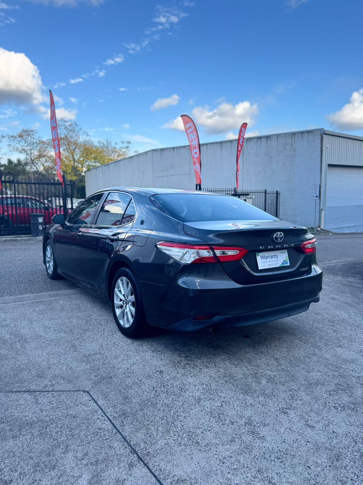 2020 Toyota Camry Ascent Hybrid Sedan – Brown