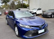 2020 Toyota Camry Ascent Hybrid Sedan in Blue.
