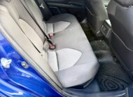 2020 Toyota Camry Ascent Hybrid Sedan in Blue.